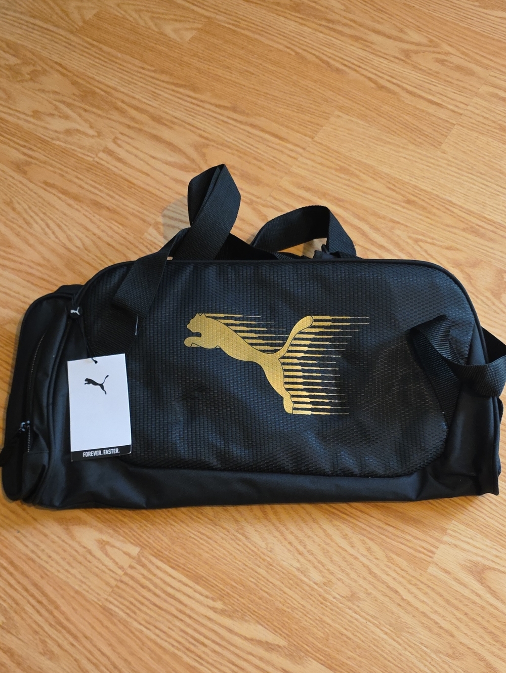 Puma Black Duffel with Gold Puma Logo